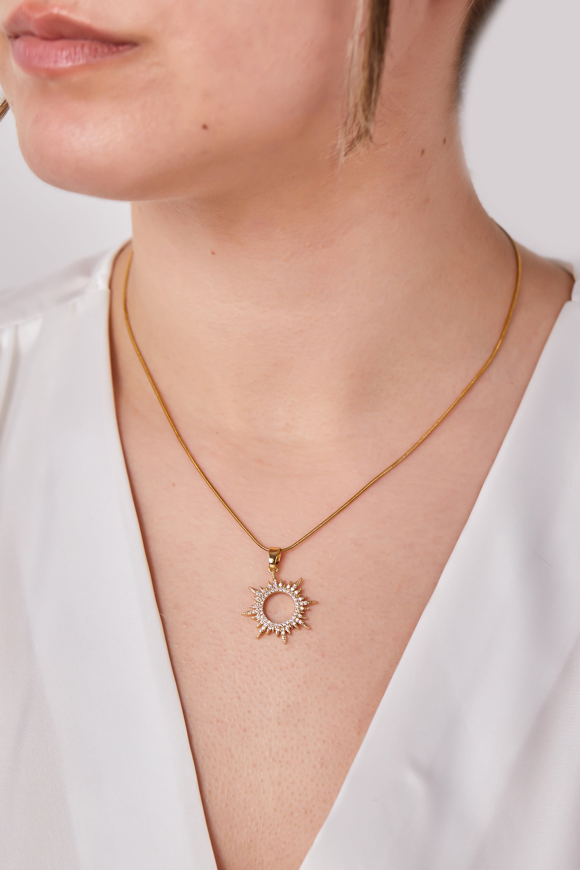 Steel Sun Necklace Gold